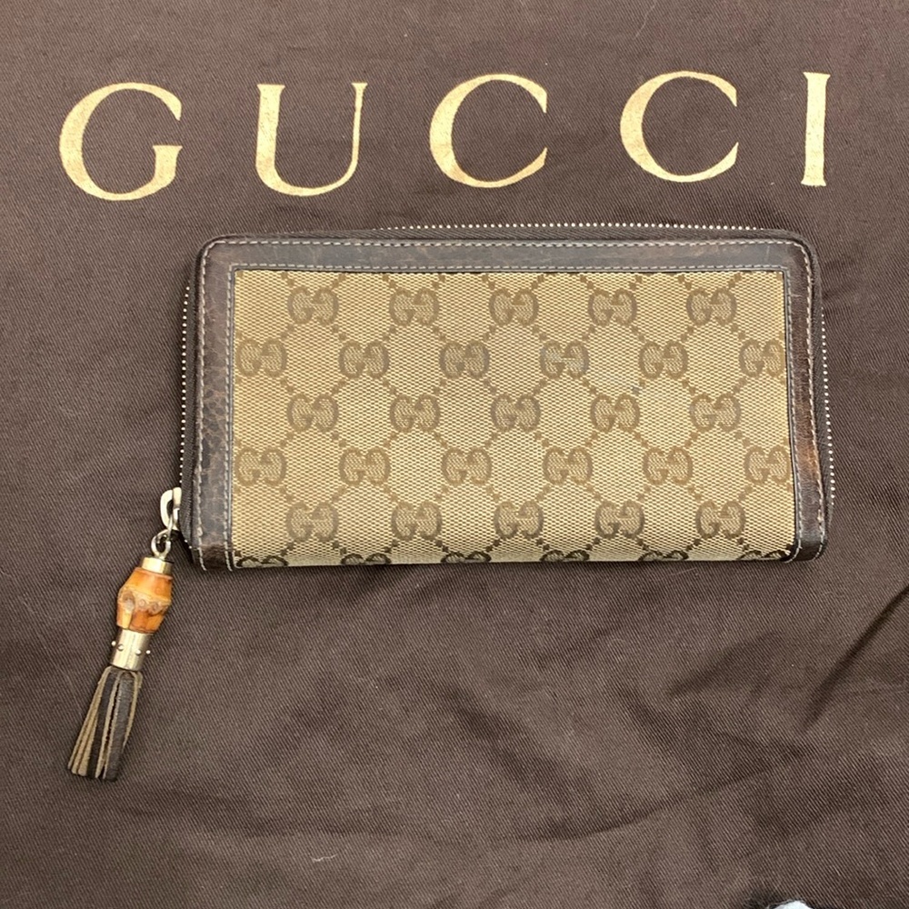 Authentic Gucci leather trim GG monogram bamboo tassel long wallet